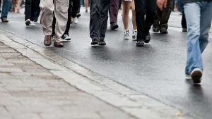 An image of people walking on a busy street